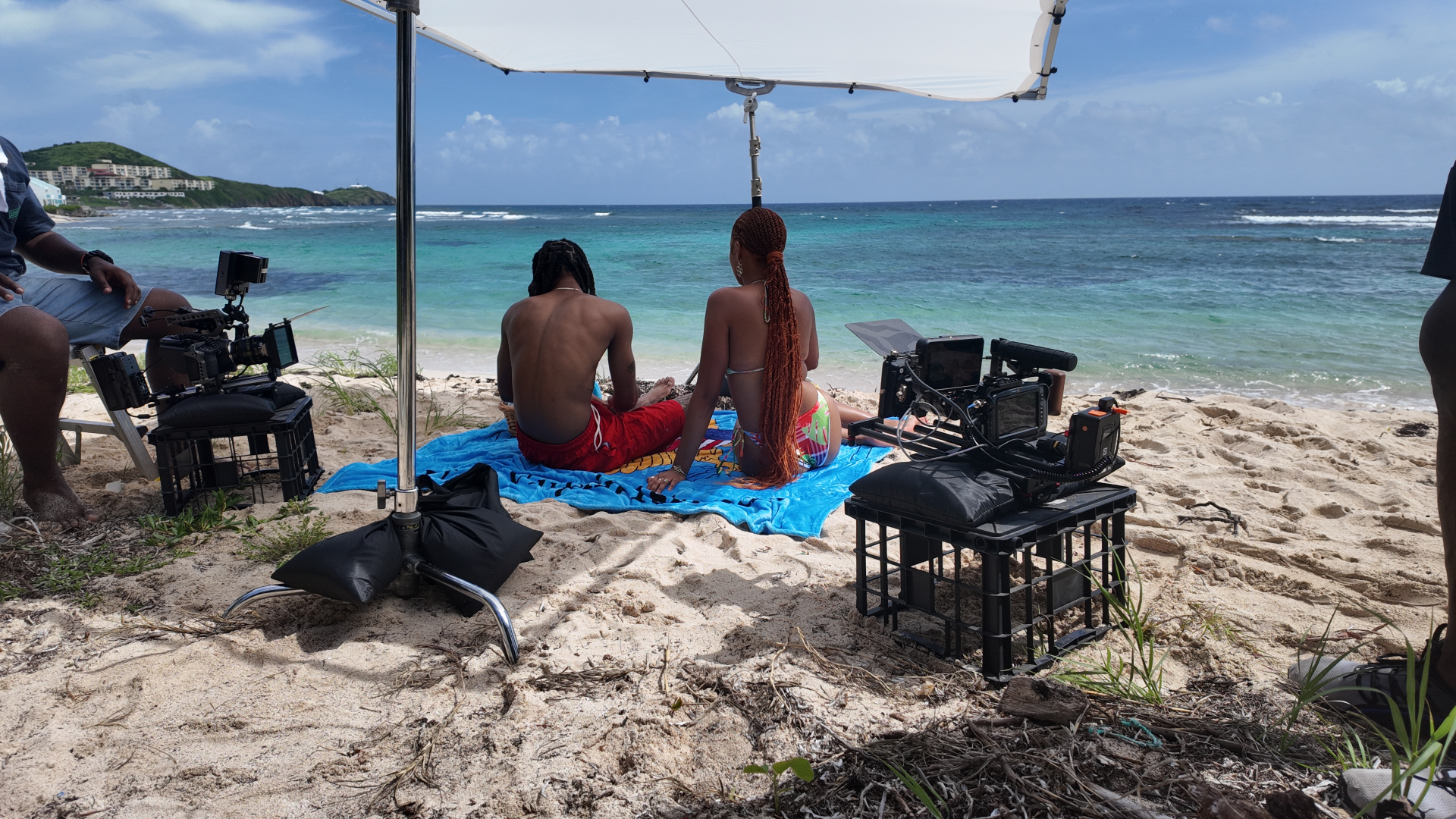 Peter Noel directing a beachfront scene with two cameras rolling in St. Croix