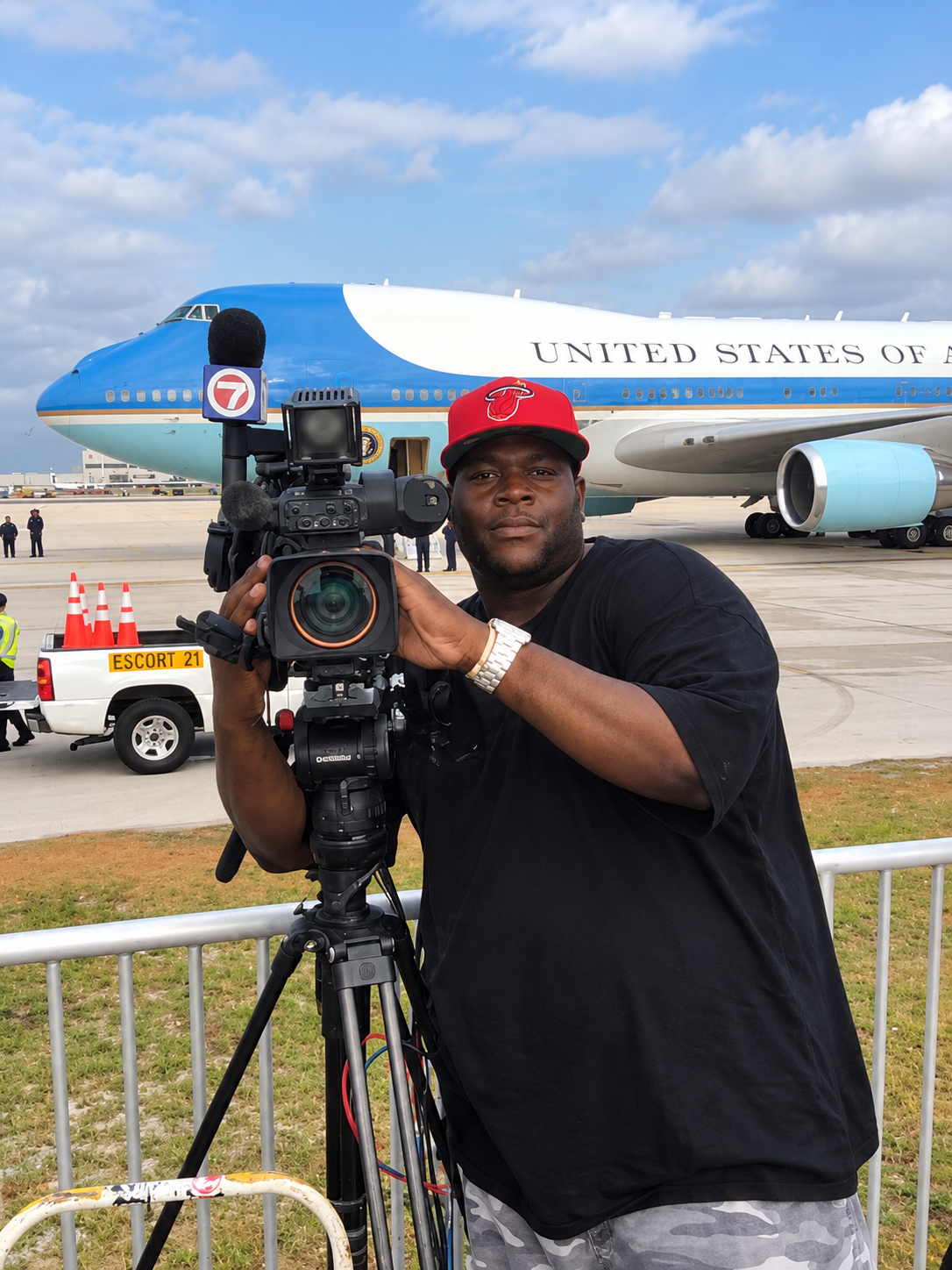 Peter Noel operating a broadcast camera during an Air Force One assignment